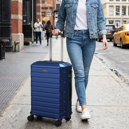 Blue hardside suitcase with 8-spinner wheels and extending handle Costway badge on sidewalk on Tampa Home & Garden Store