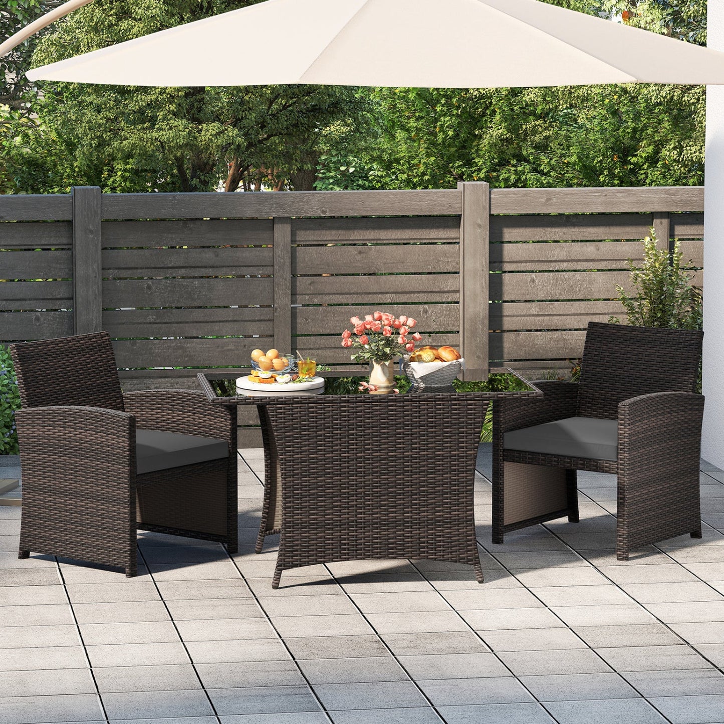 3-Piece wicker patio dining set with tempered glass table and brown chairs by DirectDeals on Tampa Home & Garden Store