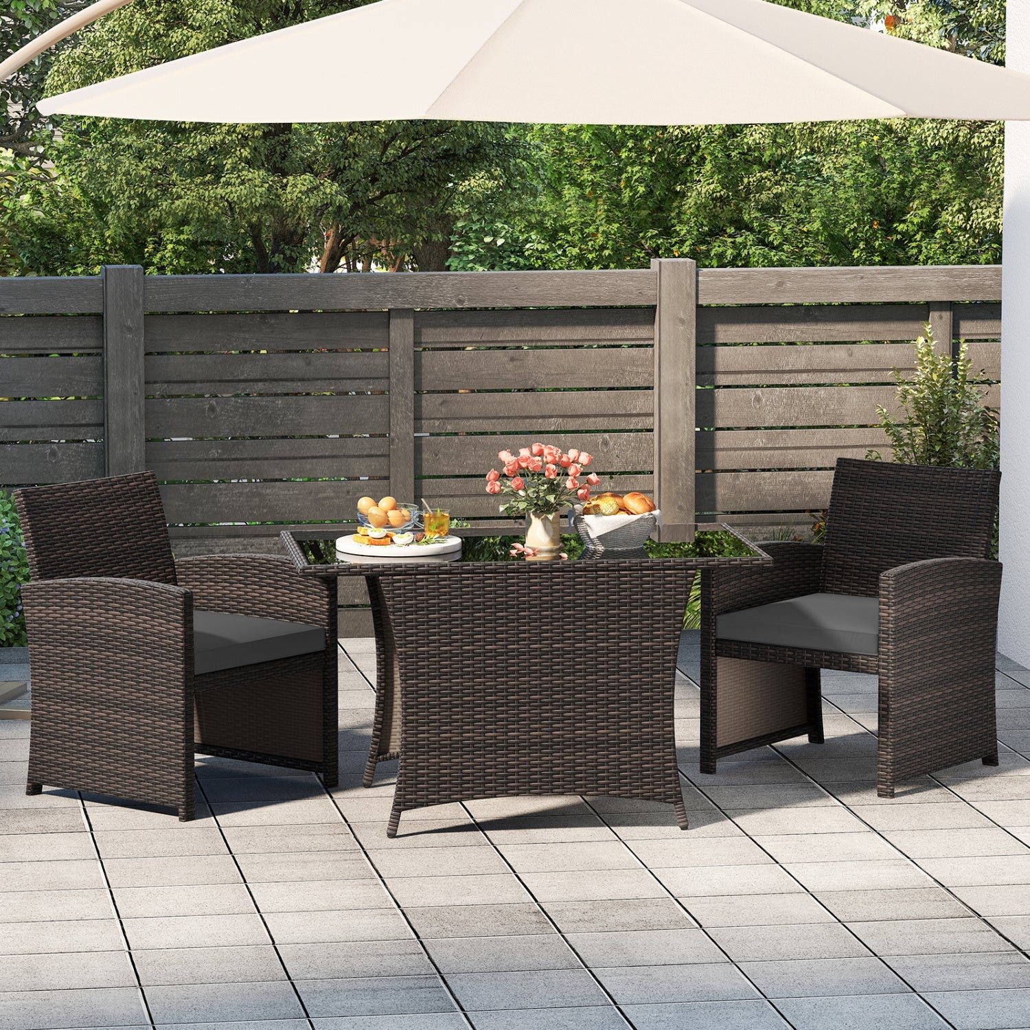 3-Piece wicker patio dining set with tempered glass table and brown chairs by DirectDeals on Tampa Home & Garden Store