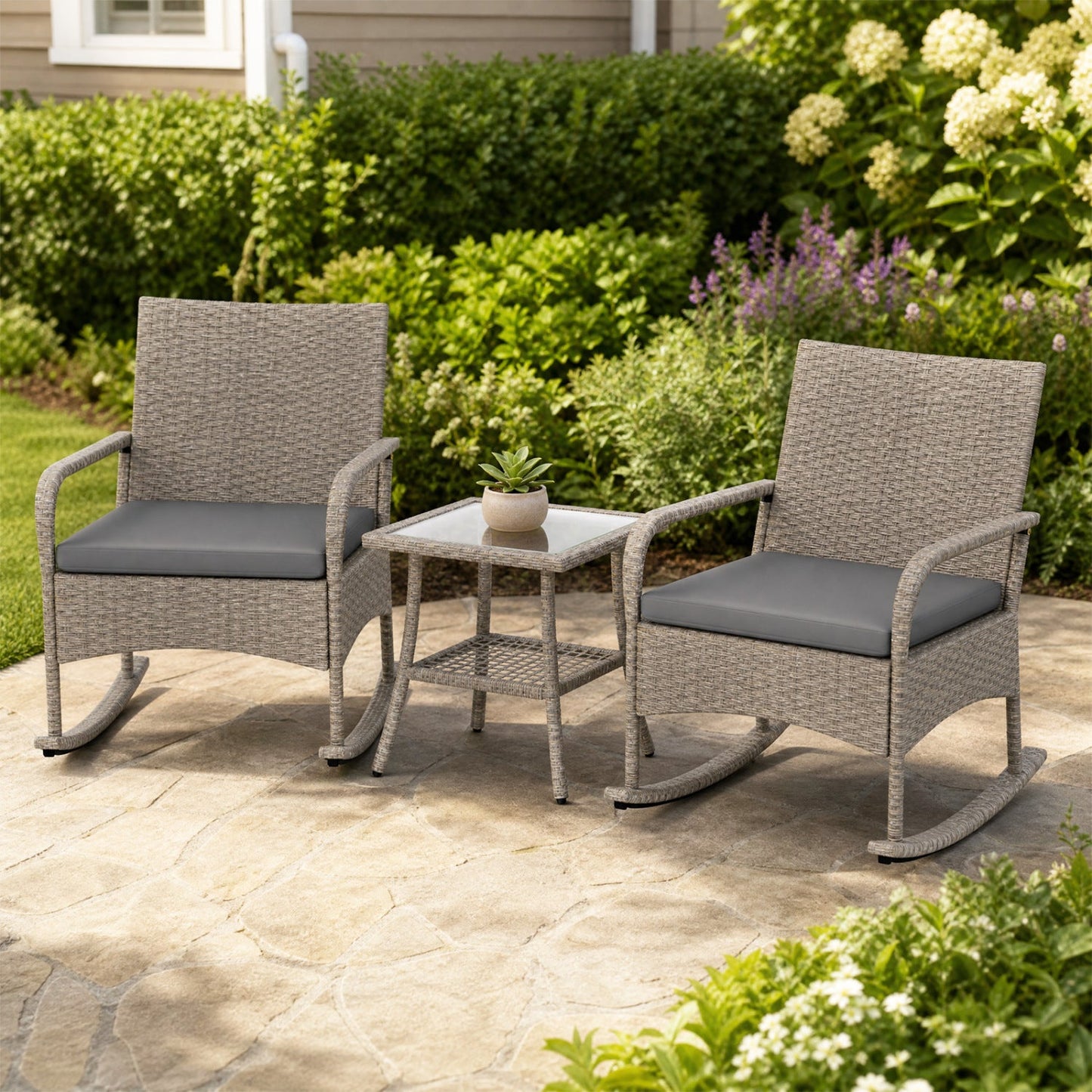 3-Piece wicker rocking bistro set with gray cushions; includes 2 chairs and table on a patio on Tampa Home & Garden Store
