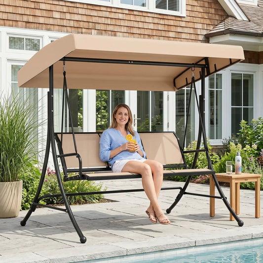 3-seat patio swing chair with adjustable beige canopy, black metal frame, poolside on Tampa Home & Garden Store
