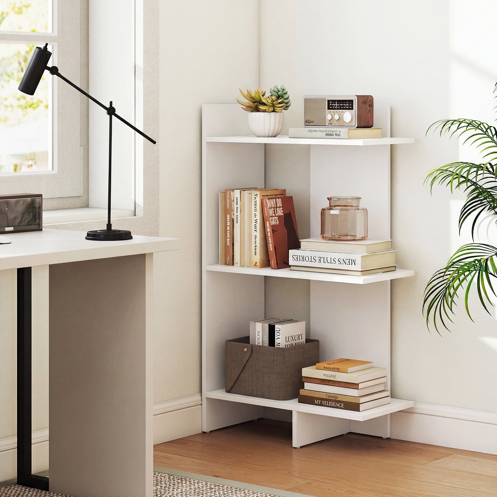 Minimalist home office with white desk, bookshelf, black adjustable lamp, and vintage radio on Tampa Home & Garden Store