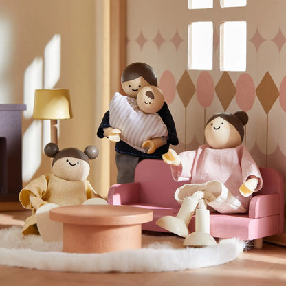Dollhouse set Tiny Land Sweetwood Pegasus with four wooden peg dolls in a pastel living room on Tampa Home & Garden Store