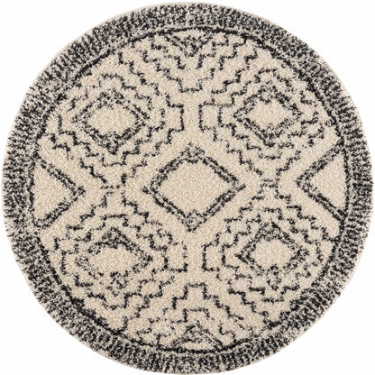 Buan round area rug in beige and black by Boutique Rugs on Tampa Home & Garden Store