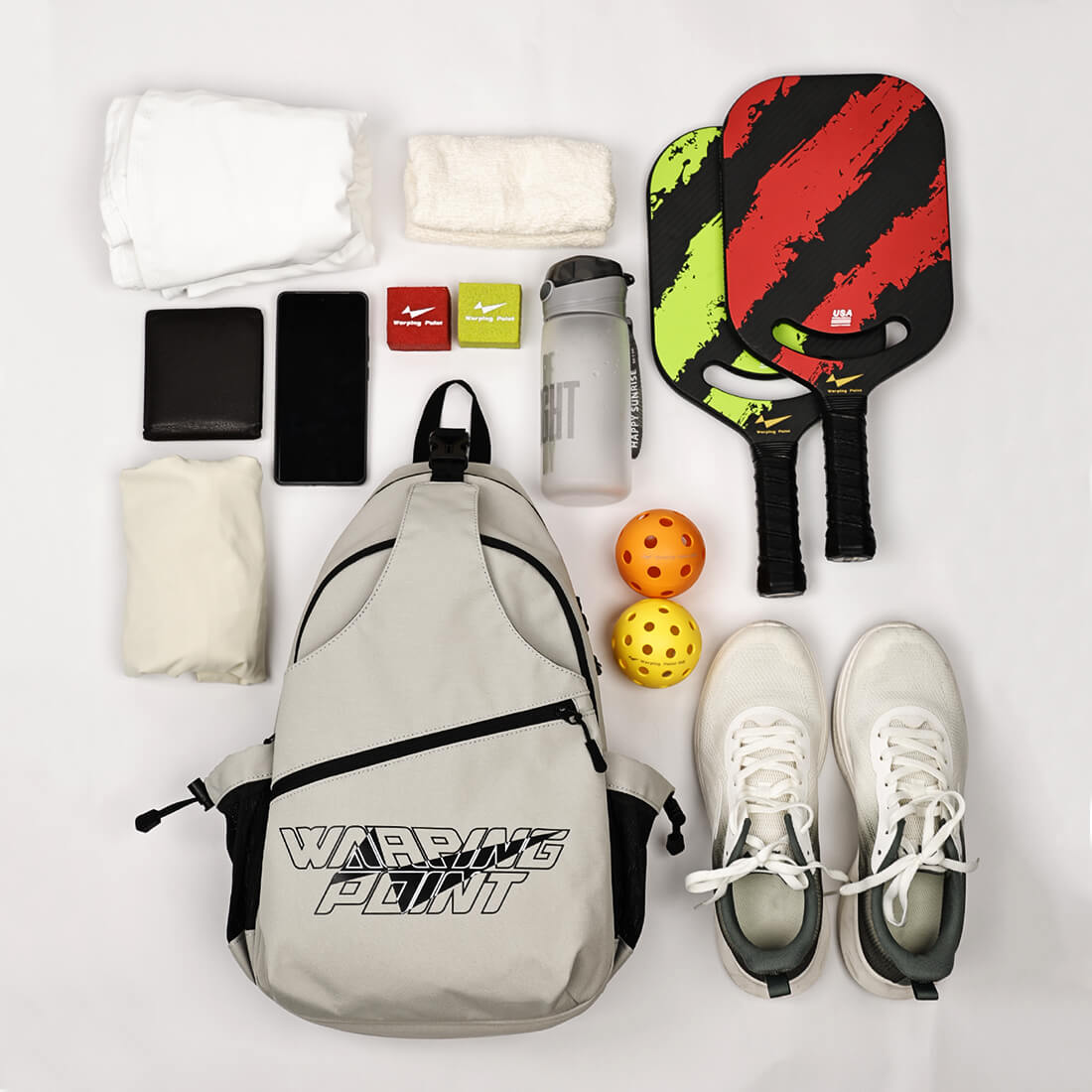 Pickleball Sling Bag - Grey by Warping Point with 2 paddles and a water bottle on Tampa Home & Garden Store