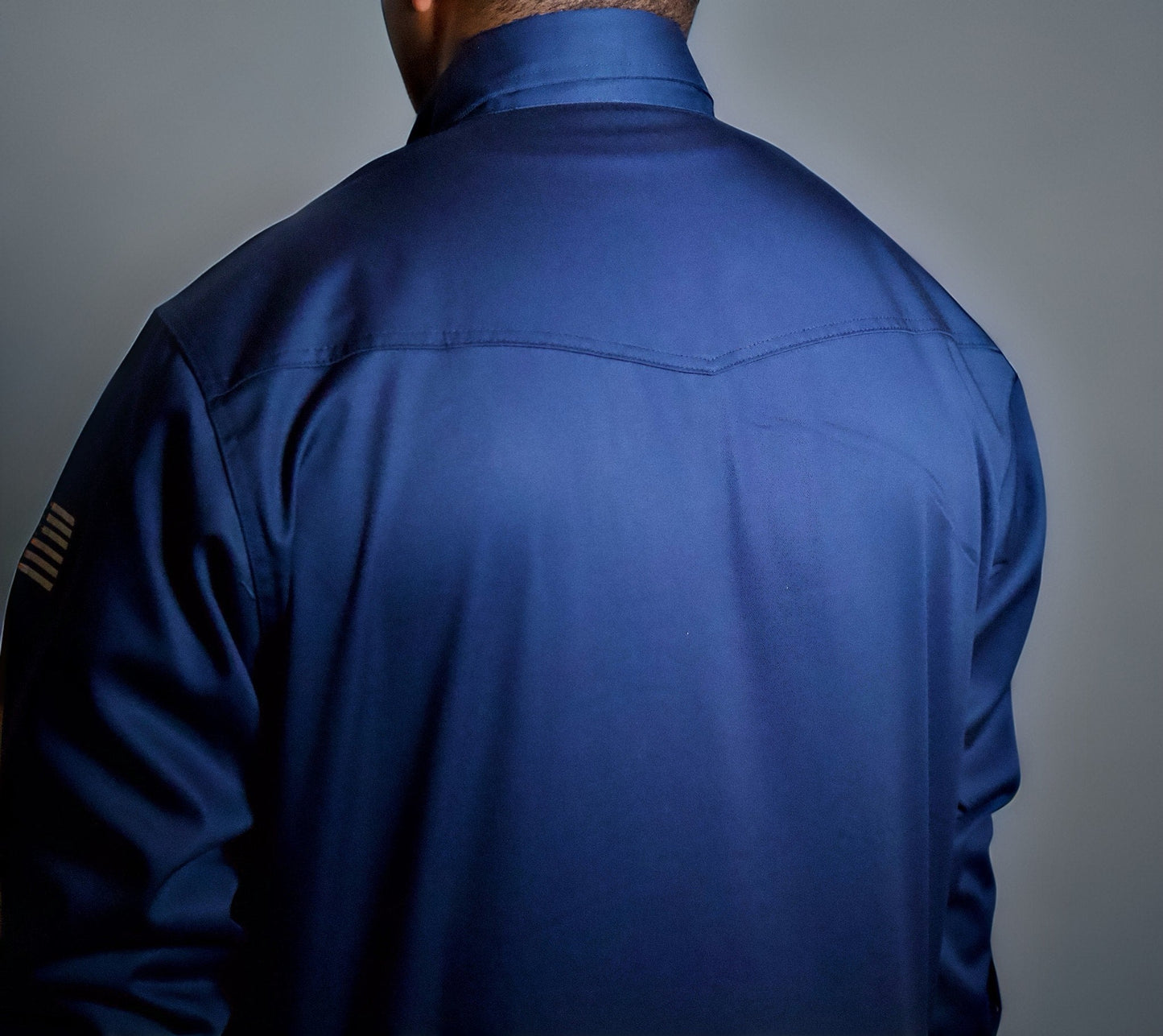 Static FR Western Style Pearl Snap Navy work shirt with U.S. flag detail, back view on Tampa Home & Garden Store