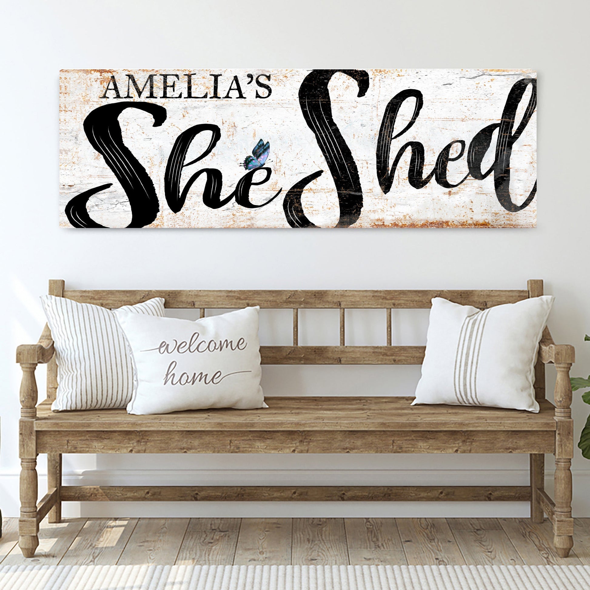 Personalized She Shed Sign canvas; white bg with bold black script and butterfly accent on Tampa Home & Garden Store