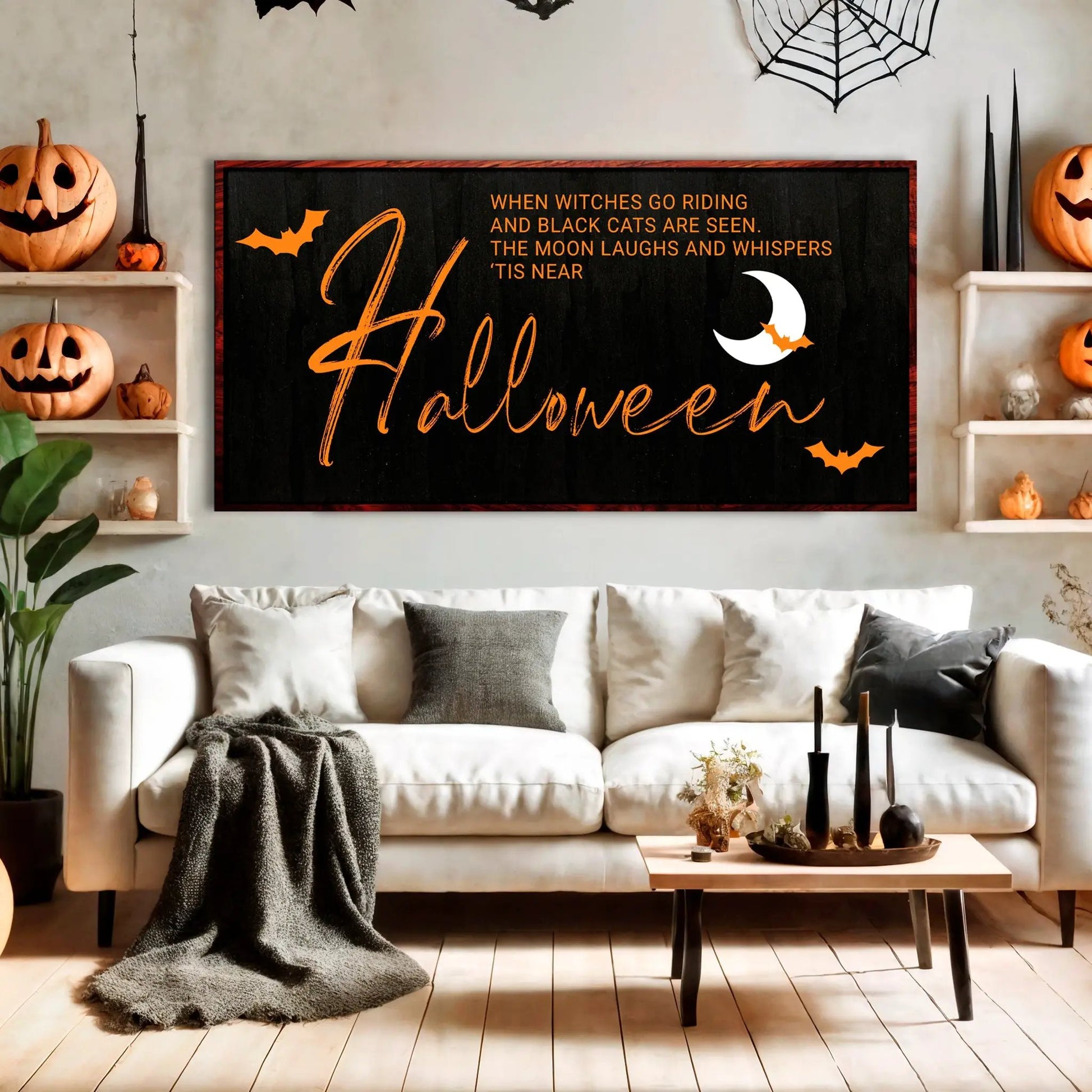 Canvas When Witches Halloween Sign by Tailored Canvases, orange script on black with bat moon on Tampa Home & Garden Store