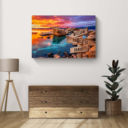 Sunset Beach Skies Family Names Sign canvas with wooden posts listing William, Charlotte, Daniel in vibrant sunset hues Tailored Canvases Crafting Canvas on Tampa Home & Garden Store