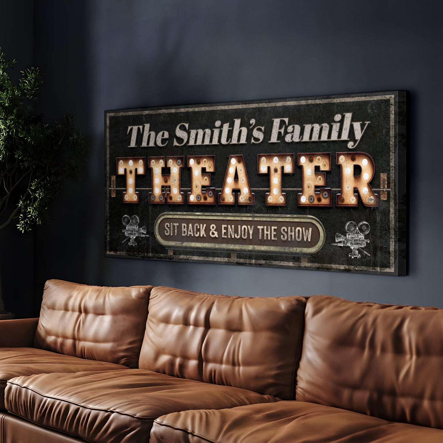 Theater Sign VIII canvas by Tailored Canvases marquee with lit letters on dark wall beside plant on Tampa Home & Garden Store