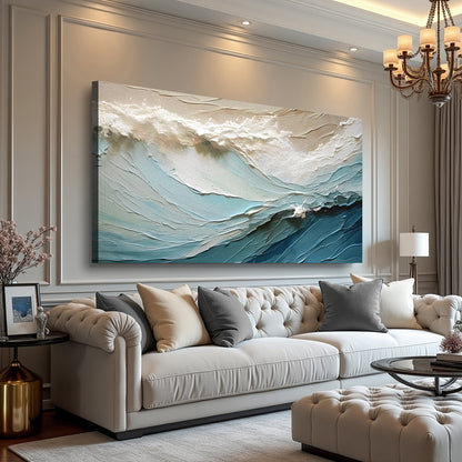 Beige minimalist canvas wall art with textured wave pattern in blue tones on paneled wall on Tampa Home & Garden Store