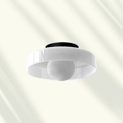 Modern LED ceiling light by Moktan Sabai featuring a white circular ring and central globe on Tampa Home & Garden Store