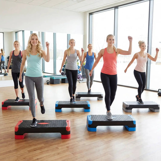 3-in-1 aerobic step platform with risers in red, blue, and black used in a group fitness class on Tampa Home & Garden Store