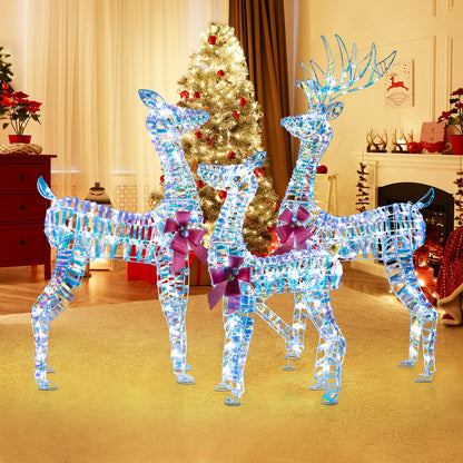 3-piece large lighted reindeer family display in blue crystal LED with pink bows in living room on Tampa Home & Garden Store