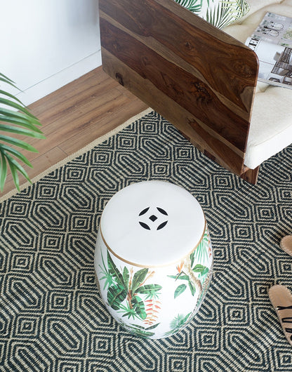 Ceramic garden stool Jungle-themed leaves, white top with black cutout motif, gold rim on Tampa Home & Garden Store