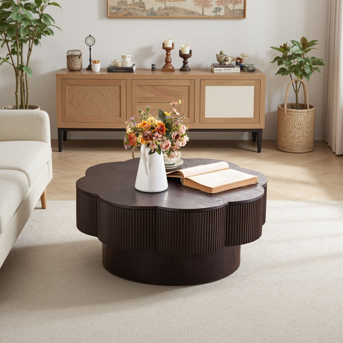 Modern plum-blossom round coffee table in dark brown with ribbed edge in a living room setup on Tampa Home & Garden Store