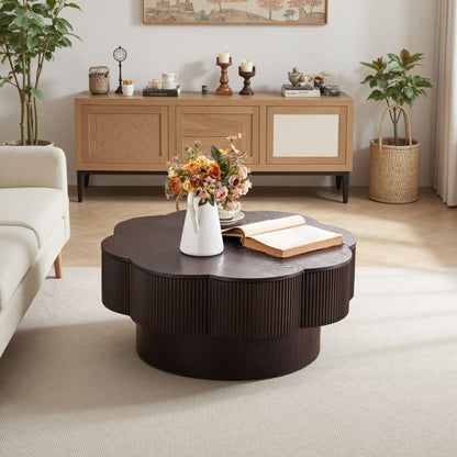 Modern plum-blossom round coffee table in dark brown with ribbed edge in a living room setup on Tampa Home & Garden Store