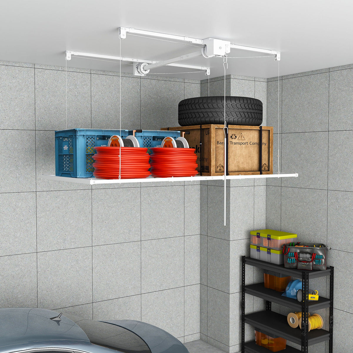 Overhead white storage rack with crank system by HouseOfZazla storing tire and boxes on Tampa Home & Garden Store