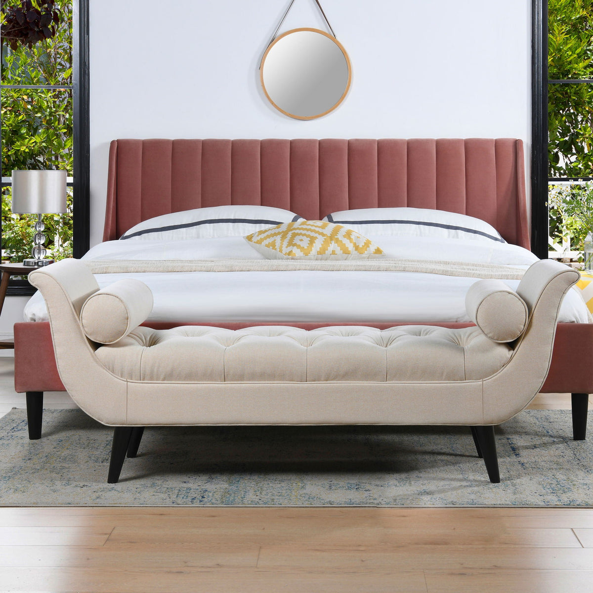 Tufted flared-arm upholstered bench beige fabric with black legs at bed foot on Tampa Home & Garden Store