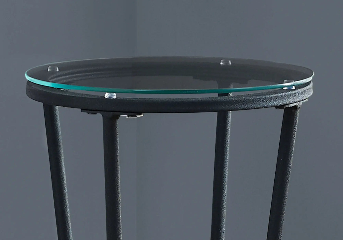 Round glass-top accent side table with black metal frame and turquoise edge ring on Tampa Home & Garden Store