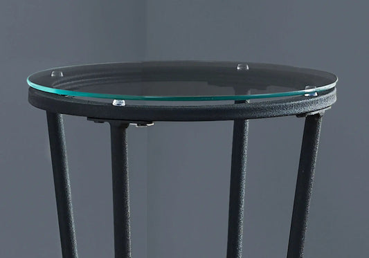Round glass-top accent side table with black metal frame and turquoise edge ring on Tampa Home & Garden Store