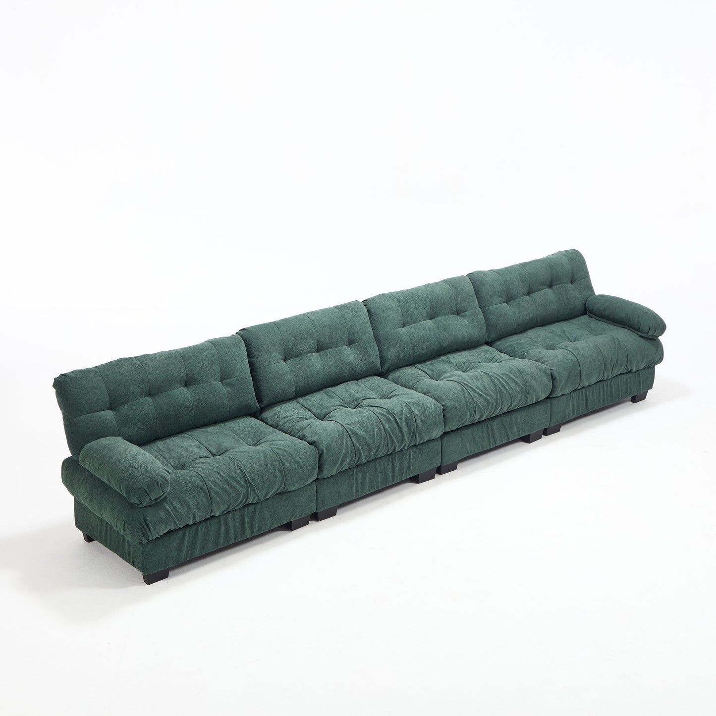 Modular sectional sofa Cloud Couch in deep green tufted fabric with low-profile black feet on Tampa Home & Garden Store