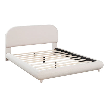 Upholstered platform bed with thick curved headboard in beige fabric and slatted base on Tampa Home & Garden Store