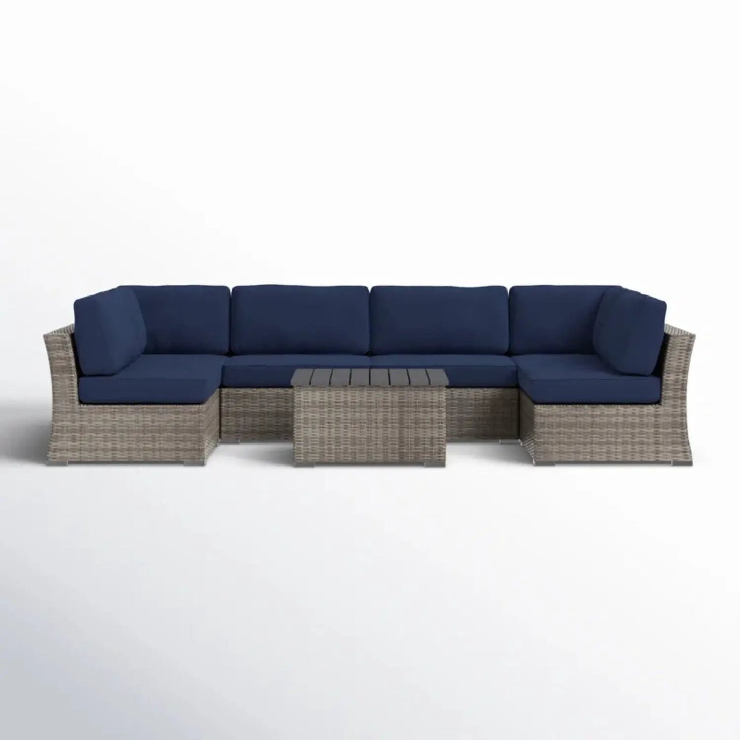 Wicker sectional sofa with navy cushions and table set by Unique Piece Furniture on Tampa Home & Garden Store