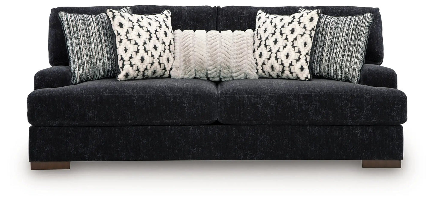 Whitmore Manor Sofa Black Pearl velvet with five decorative pillows on low wooden legs on Tampa Home & Garden Store