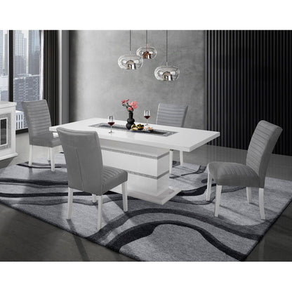 Ariya high gloss white dining table in a modern dining room with gray upholstered chairs on Tampa Home & Garden Store