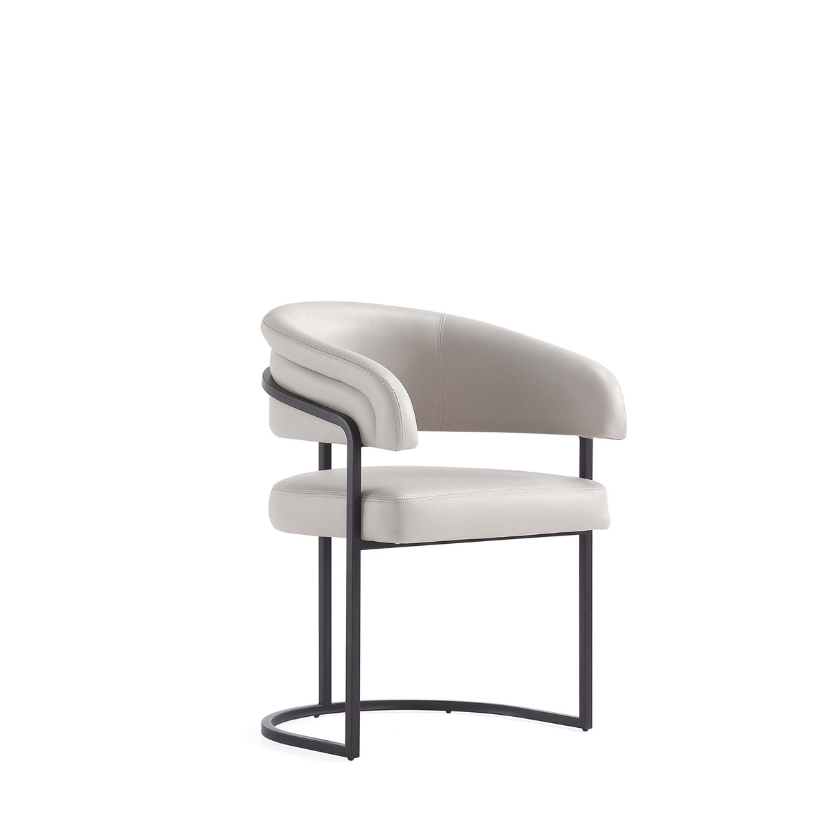 Geometric base dining chair with light gray vegan upholstery and black cantilever frame on Tampa Home & Garden Store