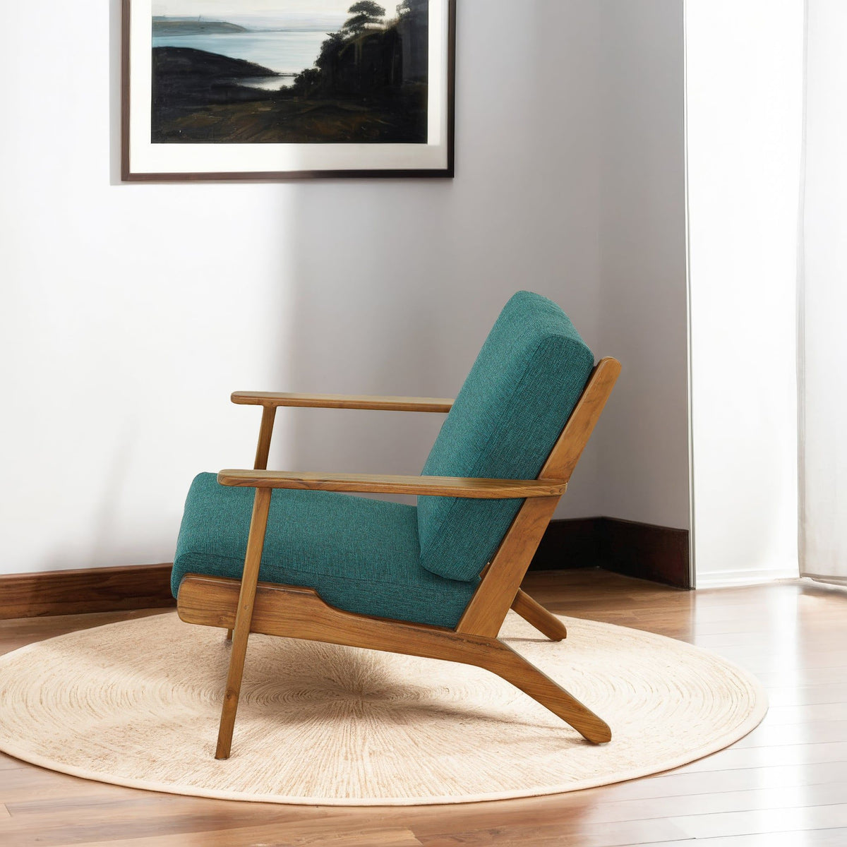 Modern lounge chair by HouseOfZazla with light blue upholstery and wooden frame on Tampa Home & Garden Store