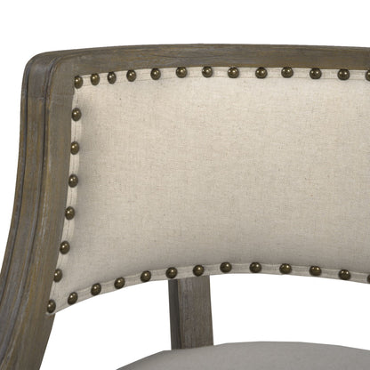 Farmhouse counter height bar stool with beige upholstered backrest and nailhead trim on Tampa Home & Garden Store