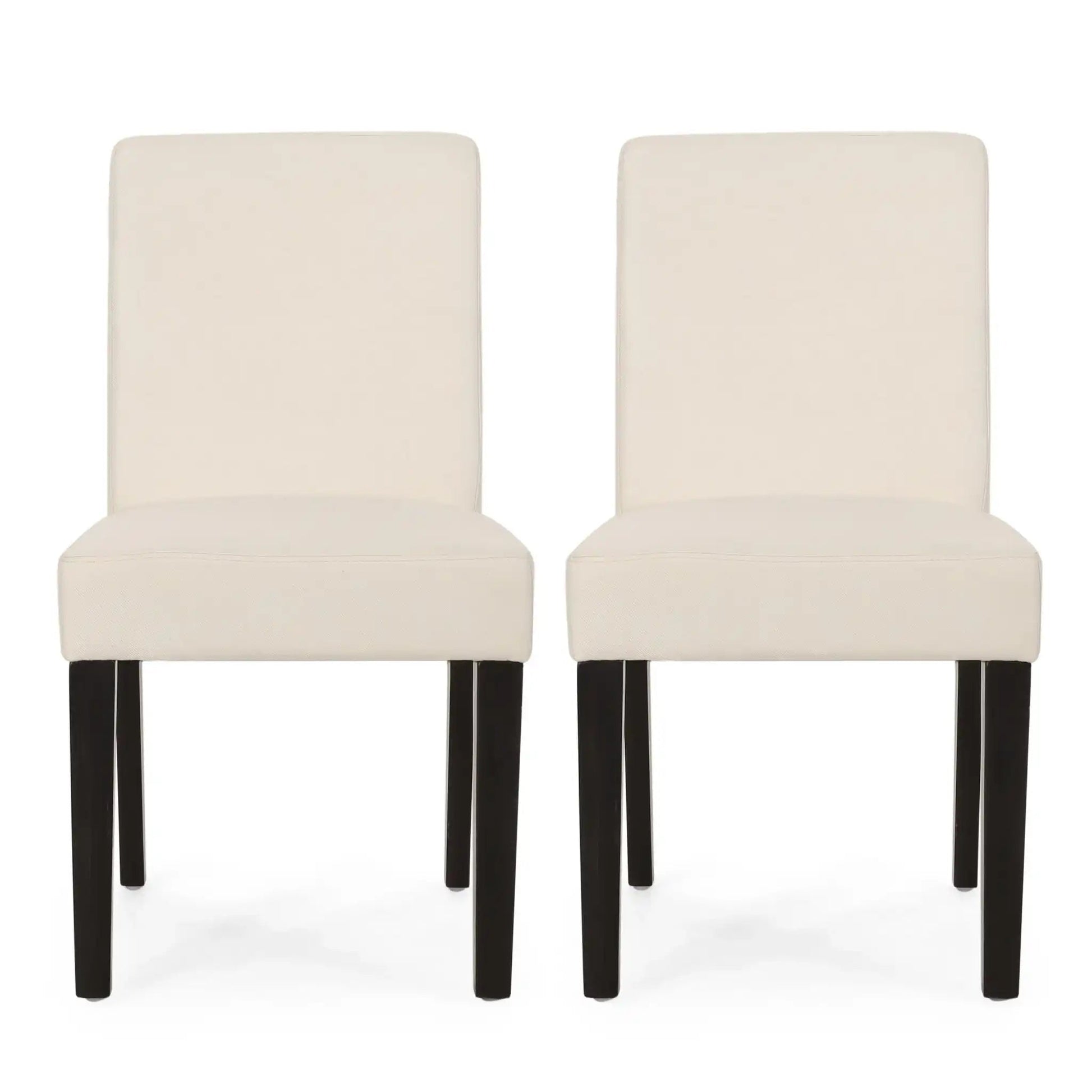 Pair of contemporary dining chairs with cream upholstery and black tapered legs by HouseOfZazla on Tampa Home & Garden Store