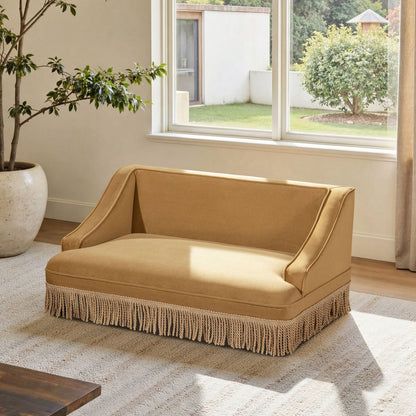 Duchess Pet Bed Sofa by HouseOfZazla, tan fabric with fringe trim in living room by window on Tampa Home & Garden Store