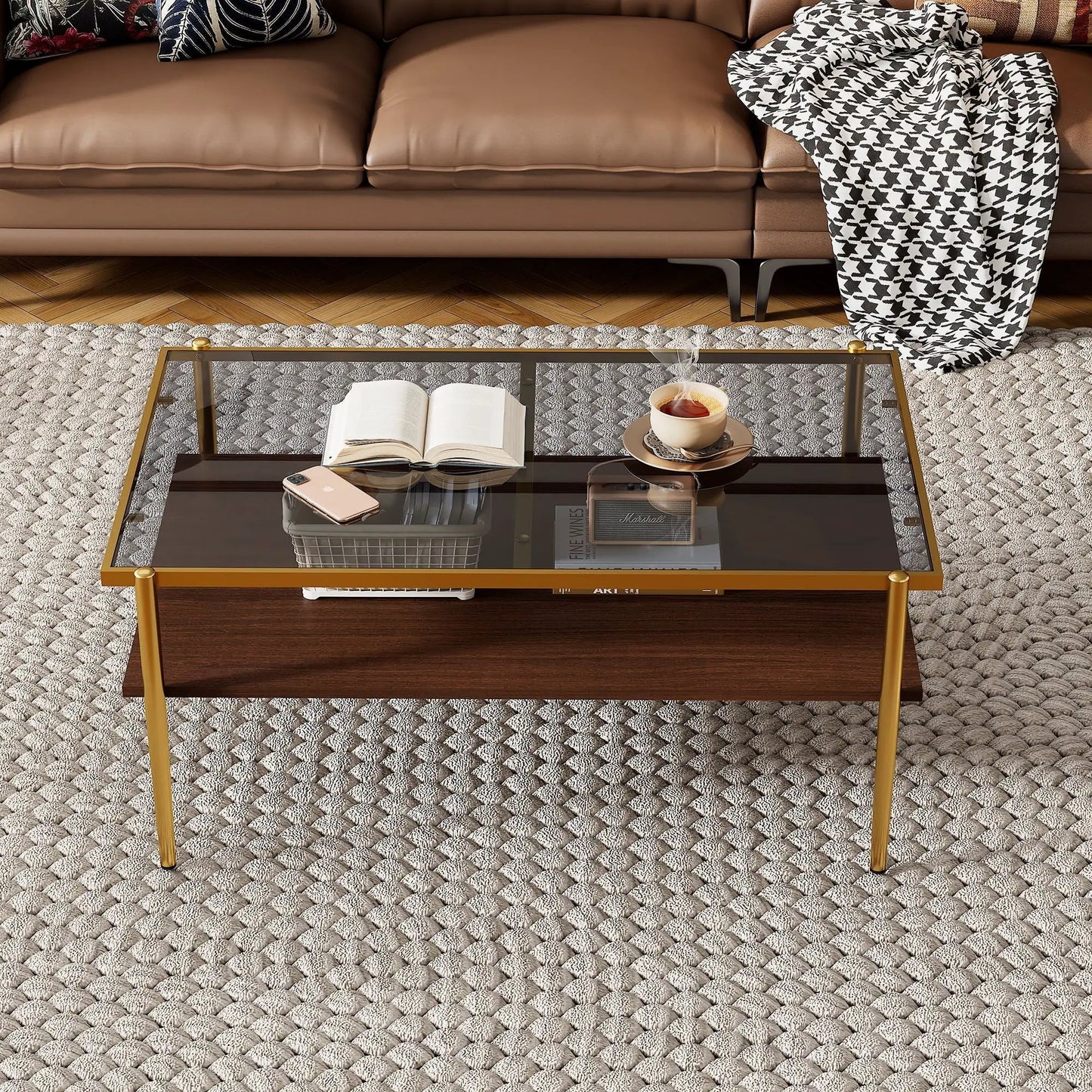 Rectangle tempered glass coffee table with gold metal legs beside a brown leather sofa on Tampa Home & Garden Store