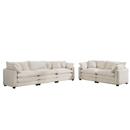 Two beige oversized sectional sofas with deep cushions and ribbed upholstery, modular layout on Tampa Home & Garden Store
