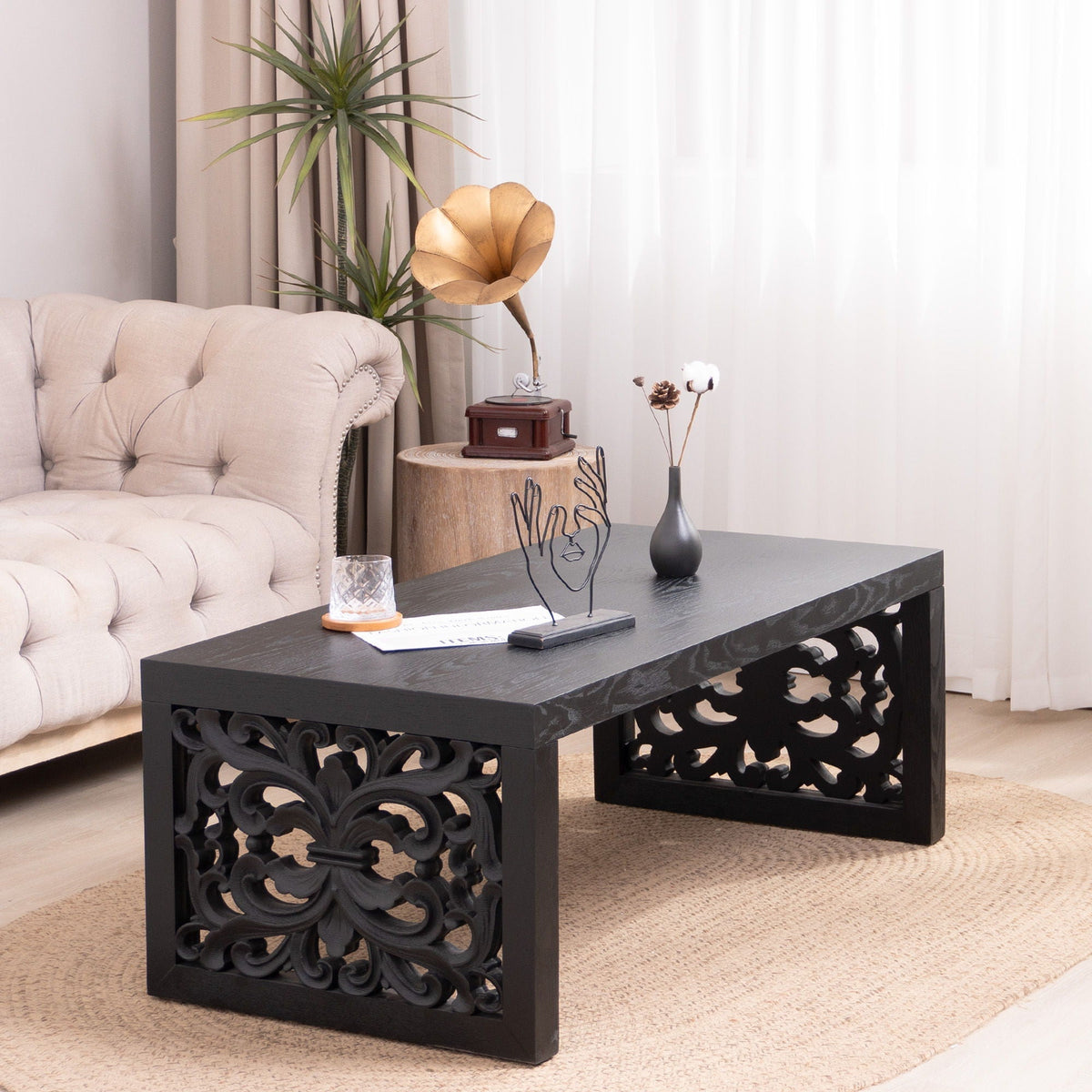 Rustic carved wood coffee table in black with ornate scrollwork by HouseOfZazla on Tampa Home & Garden Store