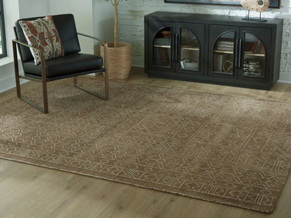 Merrittman brown geometric area rug by Unique Piece Furniture in a living room setting on Tampa Home & Garden Store
