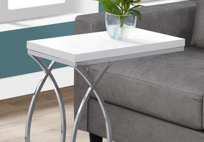 C-shaped accent table with white top and chrome X-frame legs beside a gray sofa on Tampa Home & Garden Store