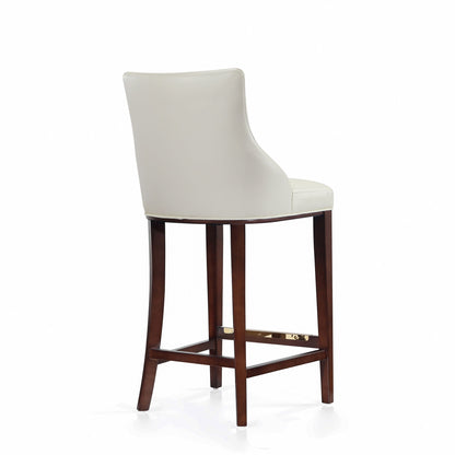 Ivory leatherette bar-height barstool with backrest and dark wood legs on Tampa Home & Garden Store