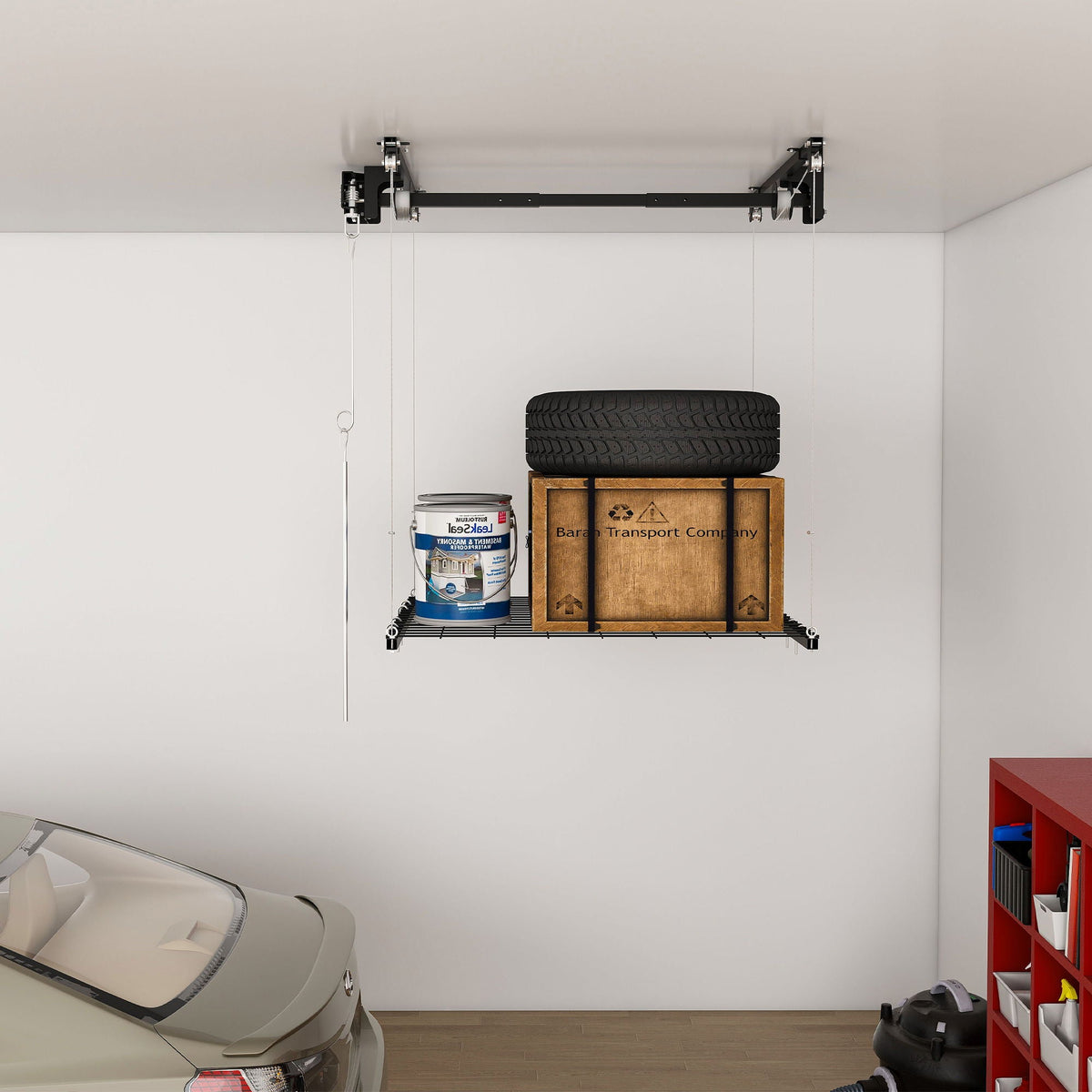 Overhead Garage Storage Rack with Crank System in black; ceiling organizer holding tire on Tampa Home & Garden Store