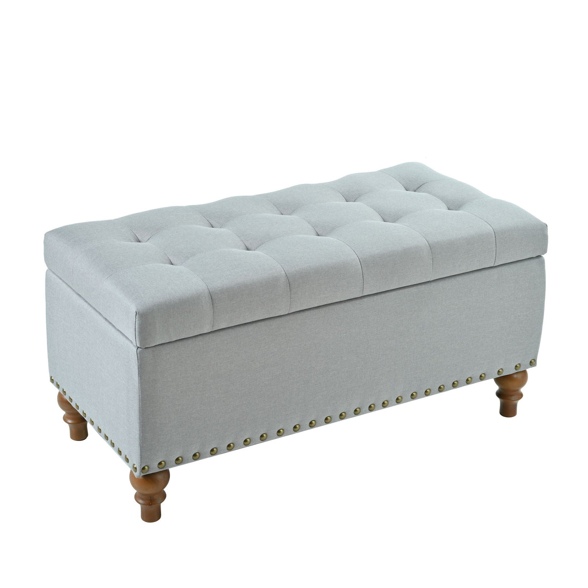 Upholstered storage ottoman with rivet trim in gray fabric by HouseOfZazla on Tampa Home & Garden Store