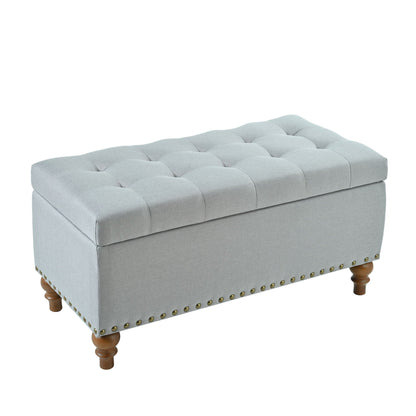 Upholstered storage ottoman with rivet trim in gray fabric by HouseOfZazla on Tampa Home & Garden Store