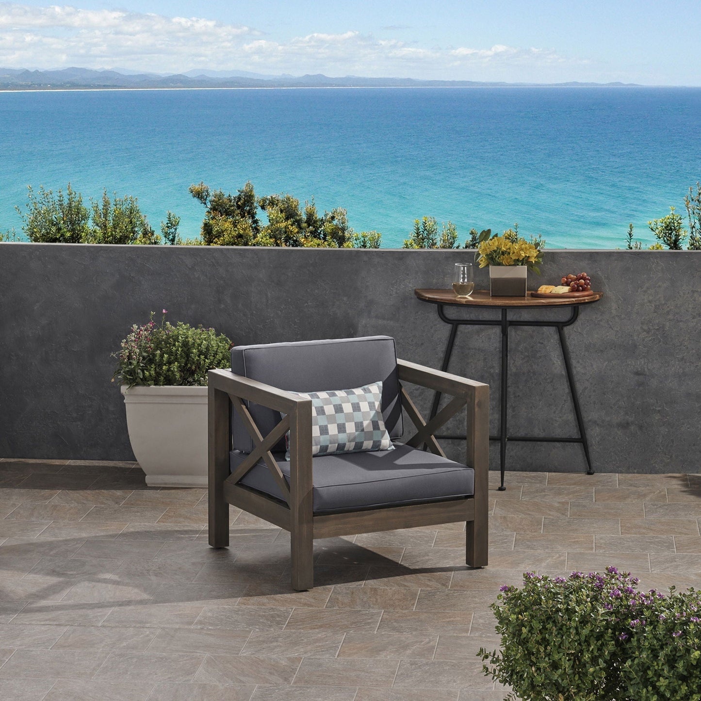 Brava Mid-Century Club Chair with dark gray cushions for outdoor use on Tampa Home & Garden Store