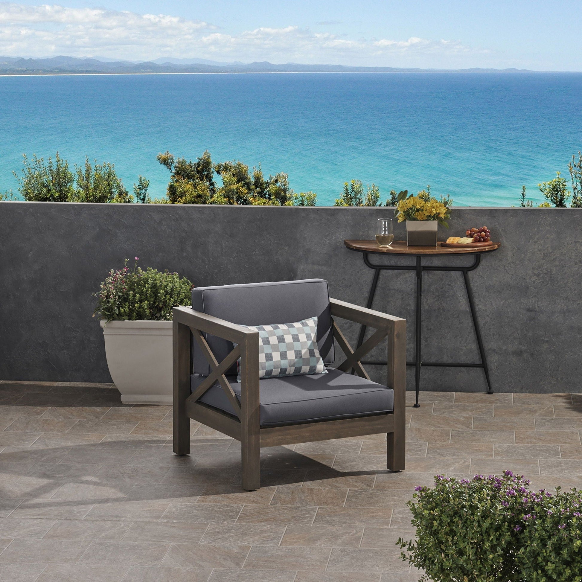Brava Mid-Century Club Chair with dark gray cushions for outdoor use on Tampa Home & Garden Store