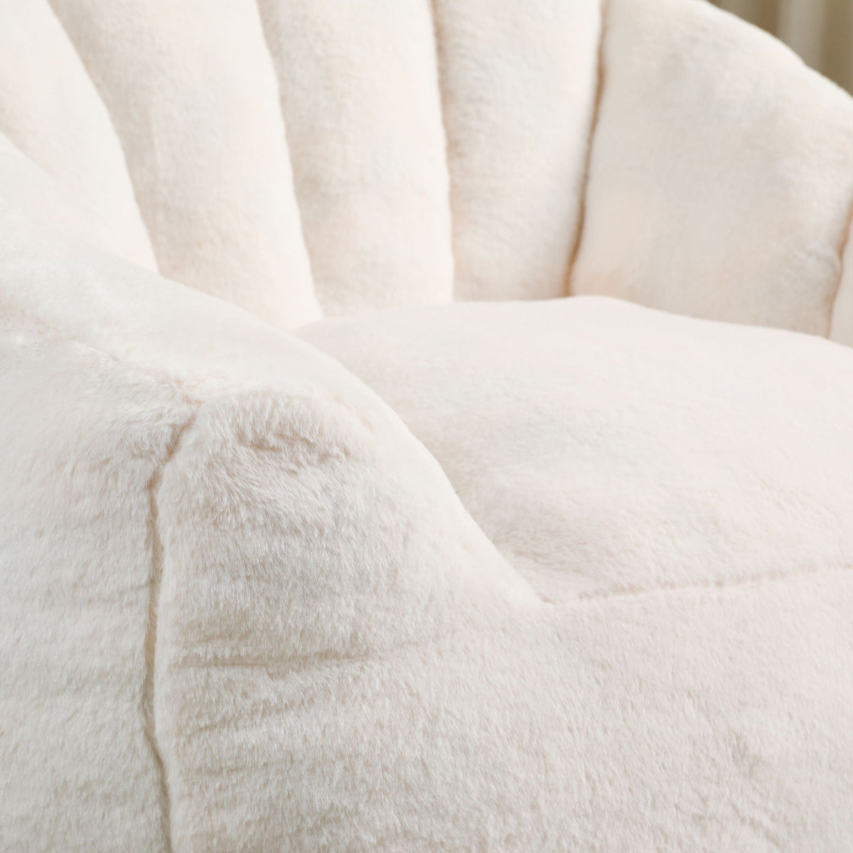 Beanbag chair with armrests in soft white plush fabric close-up texture on Tampa Home & Garden Store