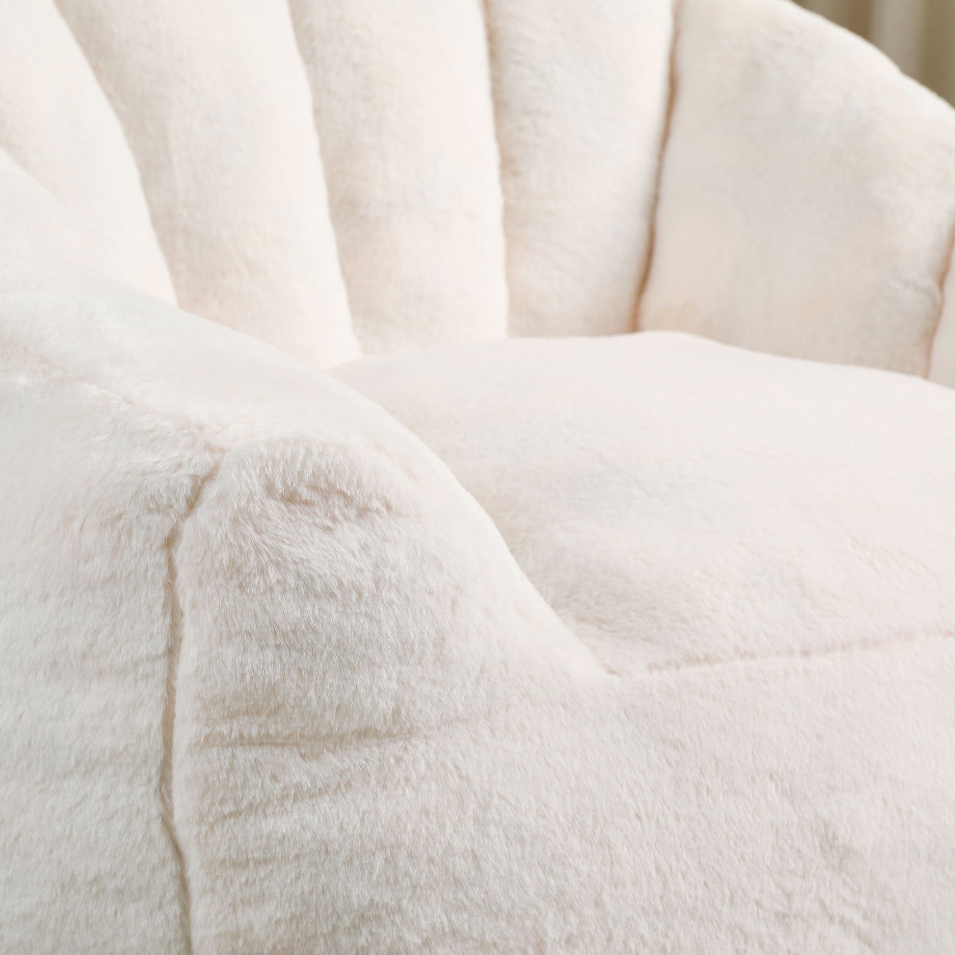 Beanbag chair with armrests in soft white plush fabric close-up texture on Tampa Home & Garden Store