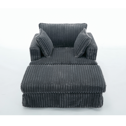 Oversized corduroy chaise lounge with ottoman in dark gray, plush ribbed upholstery on Tampa Home & Garden Store