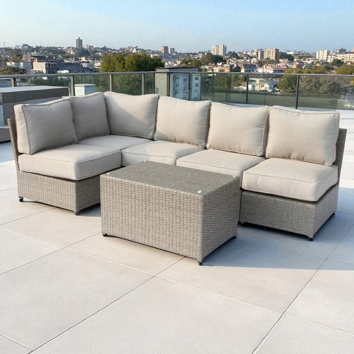 2-piece outdoor rattan sectional set with beige cushions and matching coffee table on Tampa Home & Garden Store